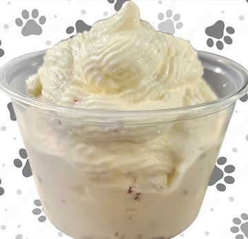 Cup of creamy white ice cream.