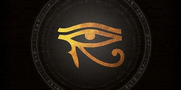 Golden Eye of Horus symbol on a dark background.