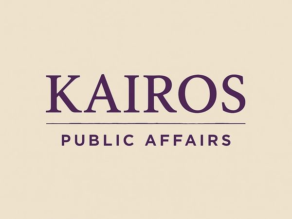 Logo of Kairos Public Affairs with elegant purple text and a beige background.