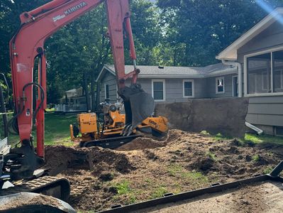 Stump grinding a wide area in Henrietta, NY