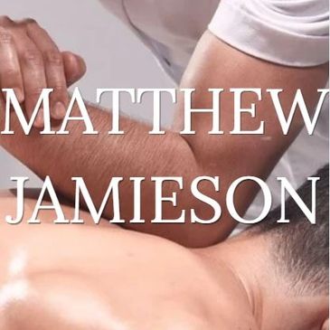 Massage therapist working on a client's back.