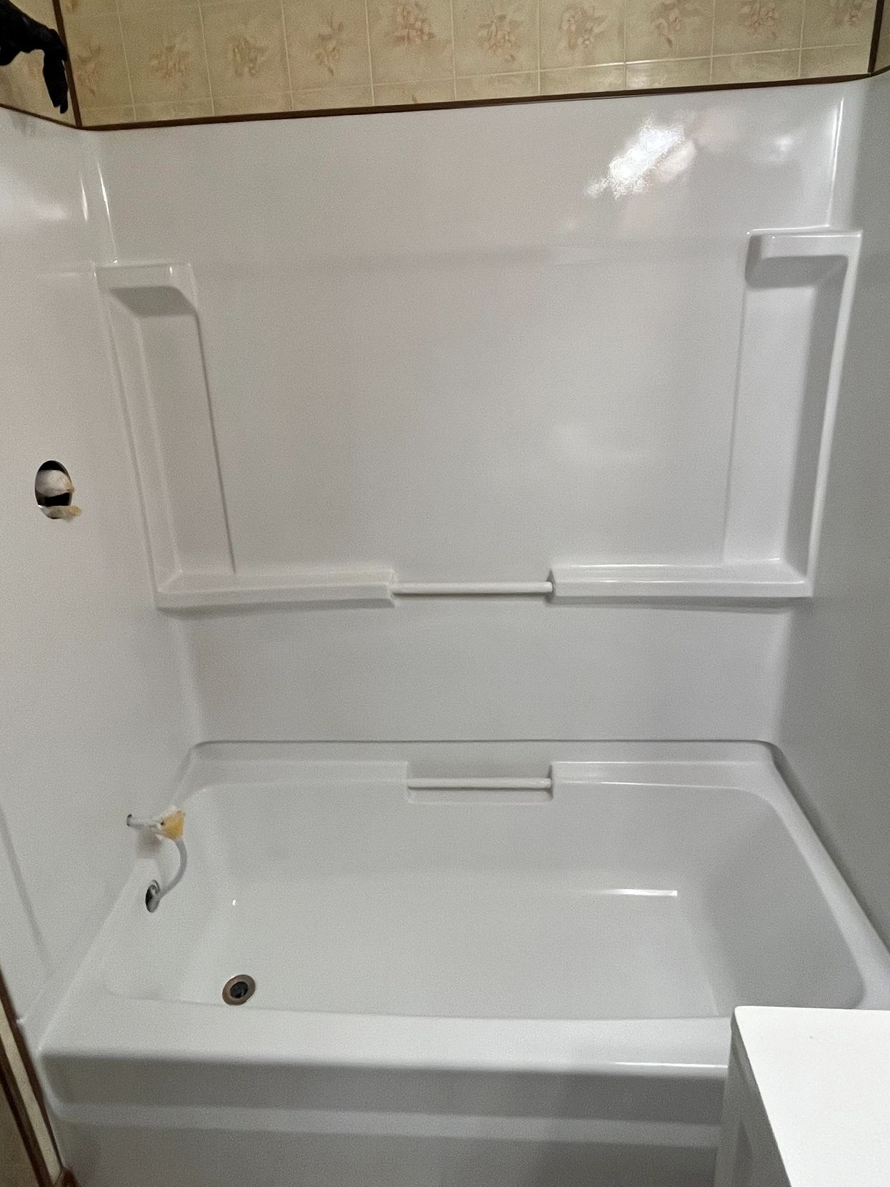 Freshly reglazed white bathtub and shower by Johnson Bath Repair in Worcester County, MA