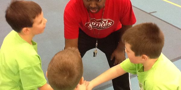 Have a team cheer learning to be team playing in a positive environment