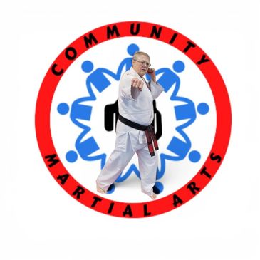 Martial artist in white uniform posing inside a community martial arts logo.