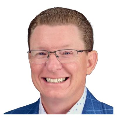 Smiling man wearing glasses and a blue checkered jacket.