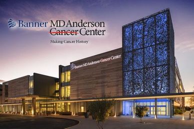 Exterior view of Banner MD Anderson Cancer Center building at dusk.