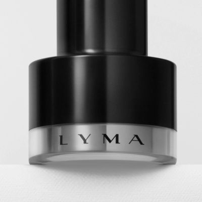 Close-up of a black cylindrical container labeled LYMA.