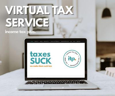 Laptop on table showing virtual tax service advertisement.