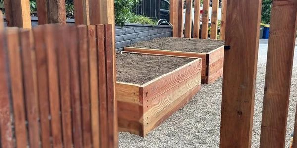 Redwood sleeper garden boxes and fencing 