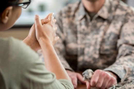 solider veteran speaking with a counselor