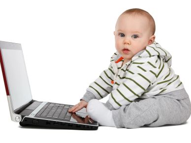 Baby using a laptop.