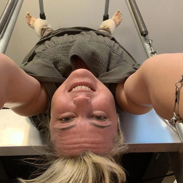 Alexis Eleniak-Radford taking a selfie while doing exercise