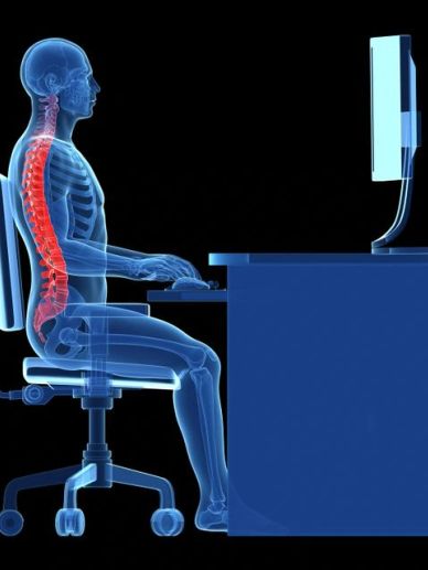 X-ray of proper sitting posture at a computer.