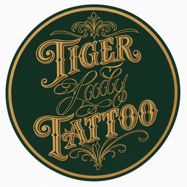 Decorative logo for Tiger Lady Tattoo in gold on dark green.