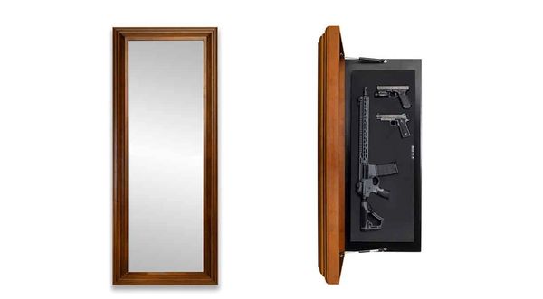 Wood-framed mirror that opens to reveal a hidden gun safe.