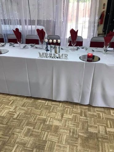 A top table set up ready for the new bride and groom in our wedding venue in St Albans.