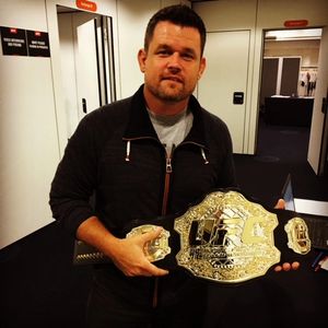 MMA Strength Coach Jeremy Fedoruk BSE.,CSCS Holding the UFC Championship Belt.