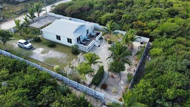 Ariel view of our home, surrounded by tropical gardens.