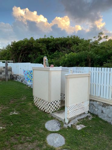 Rinse off the salt and sand, after a day at the beach with outdoor shower featuring hot/cold water.