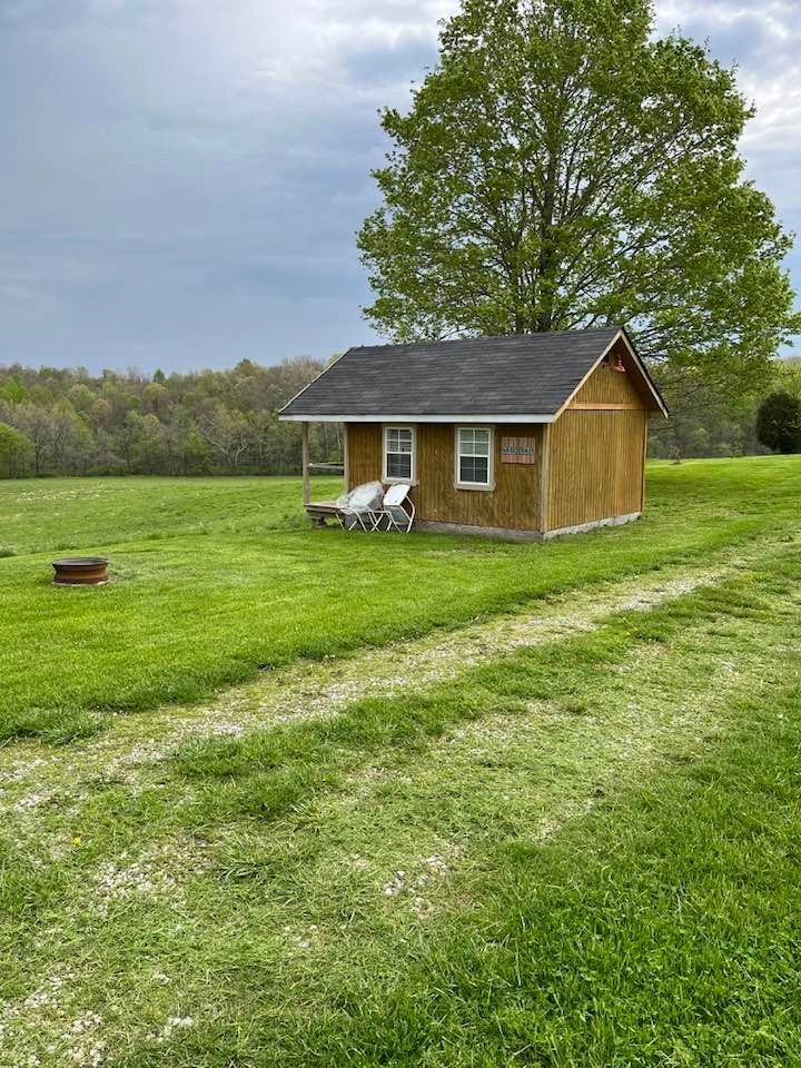 Hilltop Hideaway Log Cabin Resort — photo 40 of 43