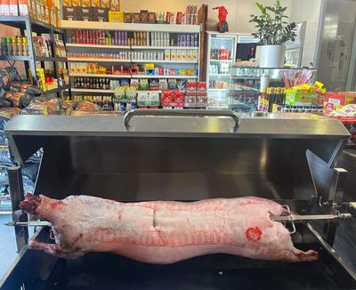 Full lamb on a spit ready to start cooking