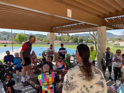 Old Kranks bicycle club members at a birthday celebration social event after a local bicycle ride