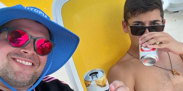 Zach and JoJo having a drink at Perfect Day at CocoCay