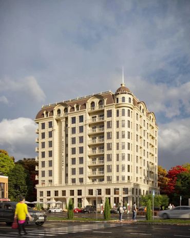 Elegant multi-story beige building under a partly cloudy sky.