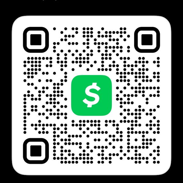 A QR code with a green dollar sign symbol in the center.
