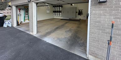 In this garage there was a low spot in the existing flooring which caused a puddle all winter long.