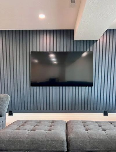 TV mounting installation in Herriman Utah with clean in wall wiring and professionally mounted TV