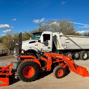 spreading and grooming of all rock materials delivered