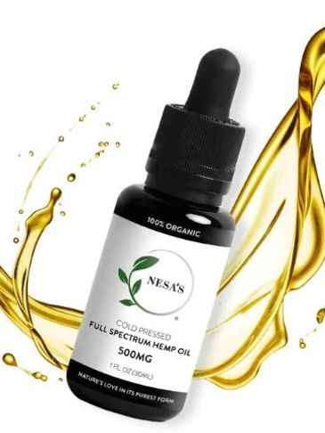 Bottle of Nesa's cold pressed full spectrum hemp oil with golden oil splash.