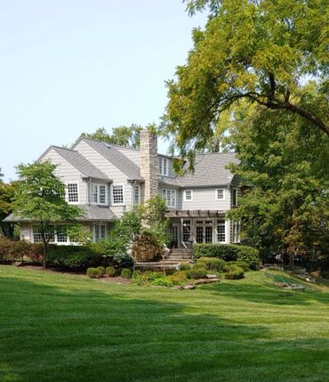 Maintained landscaping with a freshly mowed yard.
