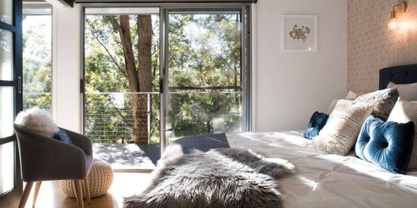 Spacious second bedroom with king bed or split singles, quality linen and private ensuite. 