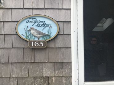 The Sandpiper Cottage logo sign