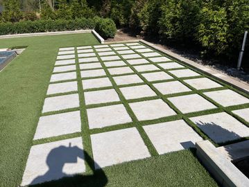 JT-81 Landscape Turf  4" spacing between custom pavers installed in West Bloomfield Michigan Canton