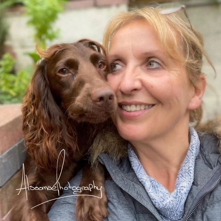 Donna Cox with chocolate cocker spaniel Bramble on her shoulder