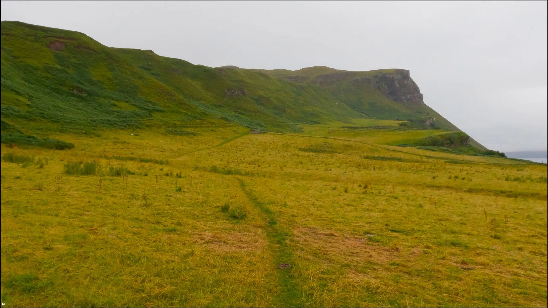 Just before the cliffs, the path climbs up past a stream. A good place to fill water bottles.