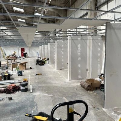 Suspended ceiling installation in progress in Kent commercial office by TJW Designs