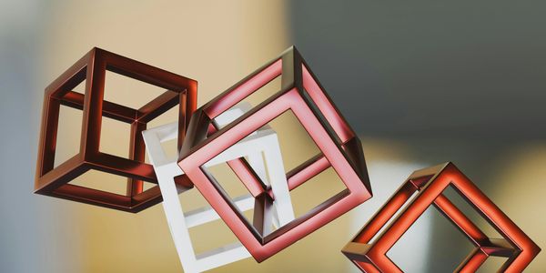 Abstract 3D cubes with glowing edges in red and white floating against a gradient background.