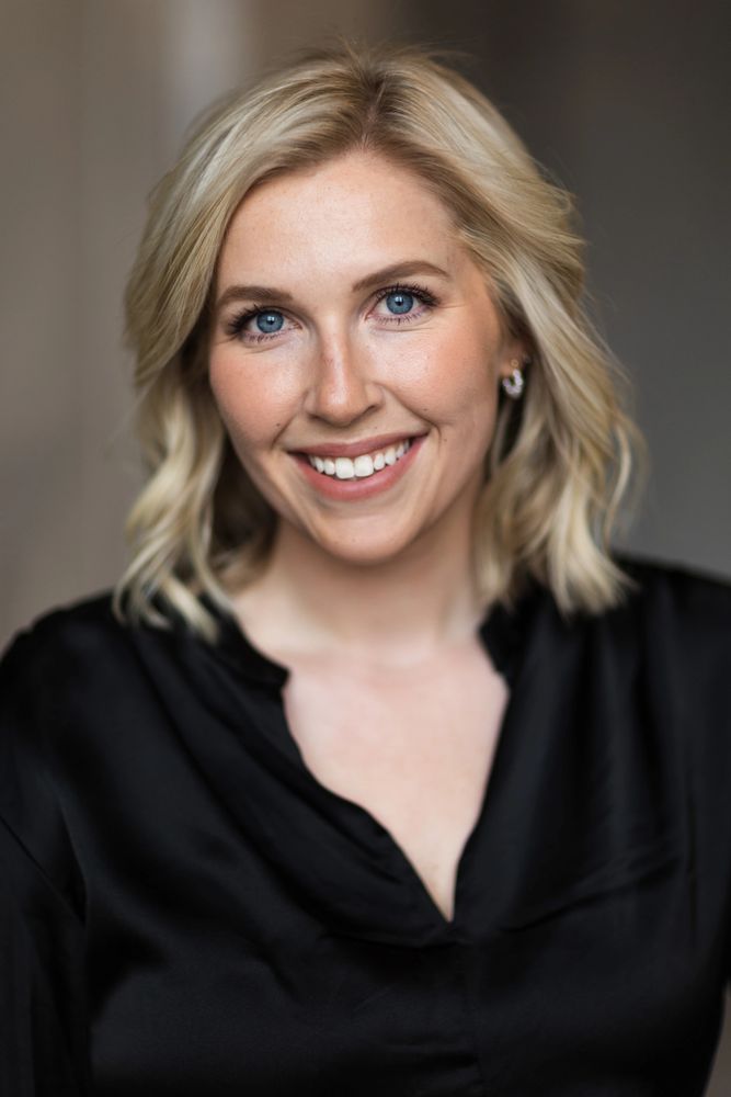 Headshot of Emma Hicks smiling.