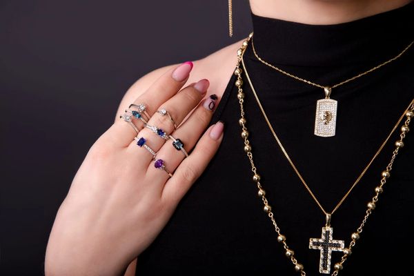 A model showcasing necklaces and rings