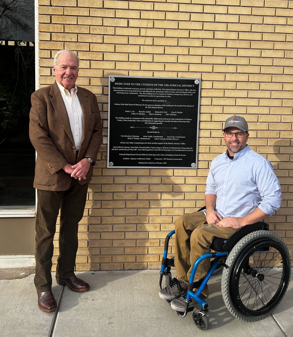 Don Spencer, A.I.A., Principal and DAvid Farnsworth, Partner pictured in front of the Dedication Pla