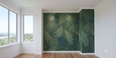 Room corner with leaf-themed wallpaper and large windows.