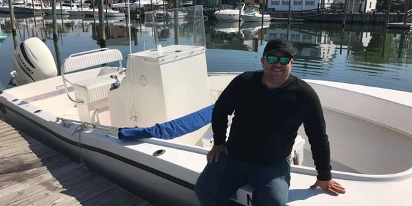 Dusky 252 T boat. Dan Sanchez owner of Gulf Live Rock. Saltwater fish tank. Aquarium Reef tank