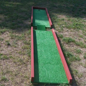 Miniature Golf Course Hole #9 is a straight-line course with a small bridge between the two sections