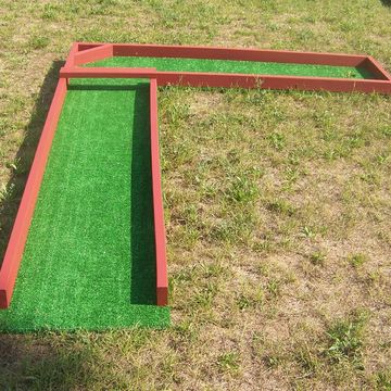 Mini Golf Course Hole #2 is a 90-degree angle to the right, this is a game rental everyone can enjoy