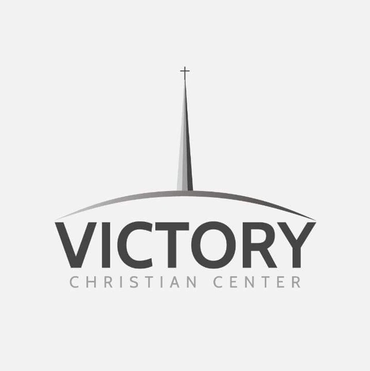 Logo of Victory Christian Center with a church steeple and cross.