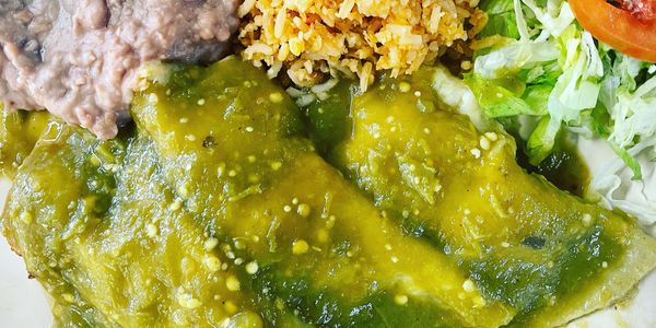 Three green sauce enchiladas filled with cheese choice of meat, rice, beans, side salad and sour cre